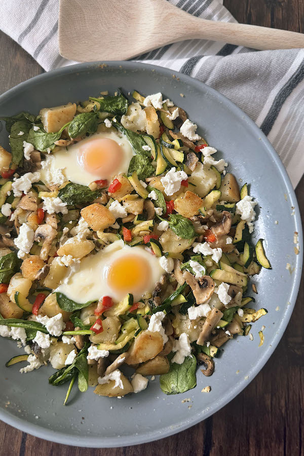 Breakfast Skillet with Potatoes, Zucchini and Mushrooms.